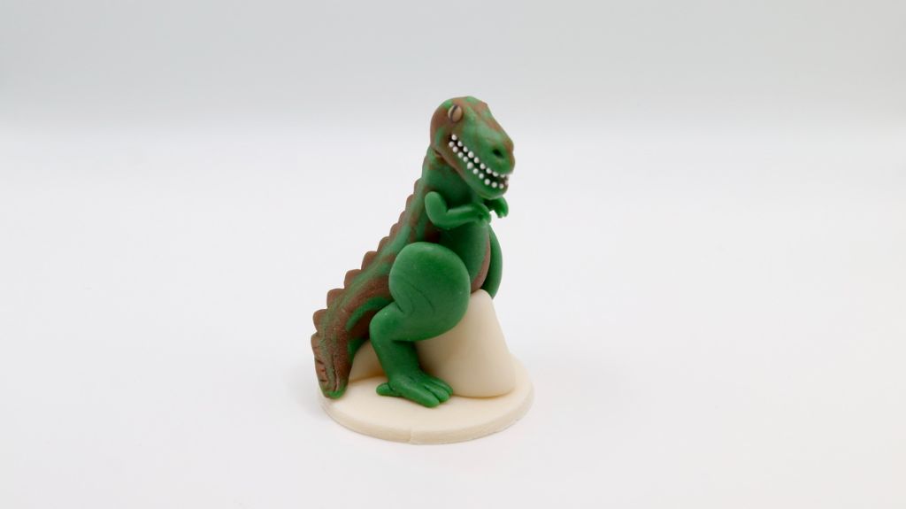 T-rex marcipán figura]
