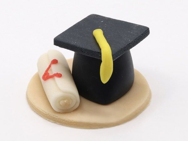 Diploma talárral]